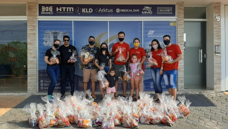 Mercado Oliveira e Ouro Fisio distribuem kits para mais de 100 crianças em Cafelândia 