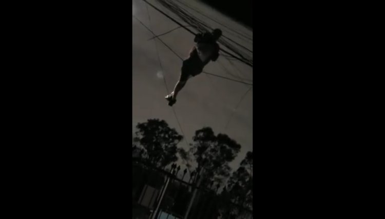 V&iacute;deo mostra homem se pendurando em cabos el&eacute;tricos para furtar fios